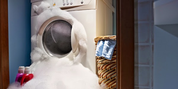Làm gì khi máy giặt trào bọt